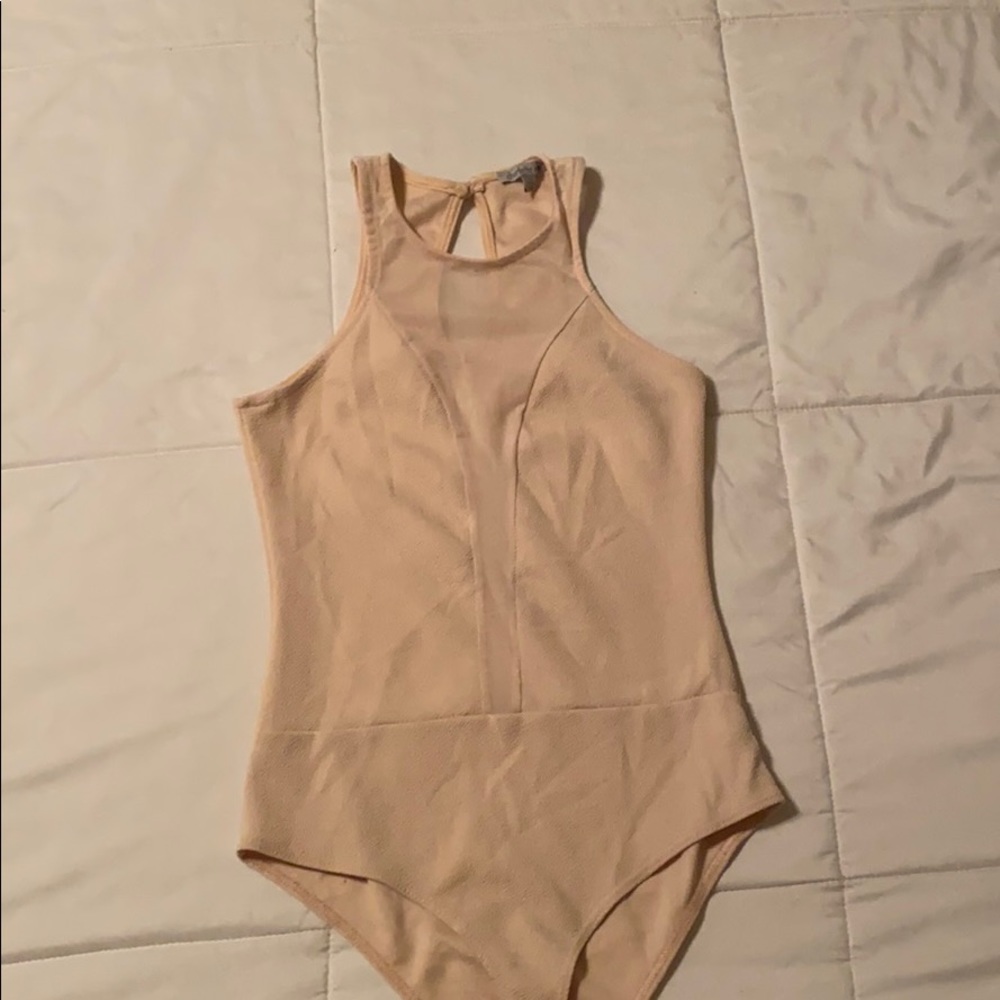 Mesh cream colored lowcut body suit, never worn